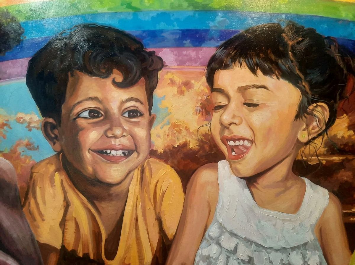 Close-up of two joyful children from the Our American Rainbow painting